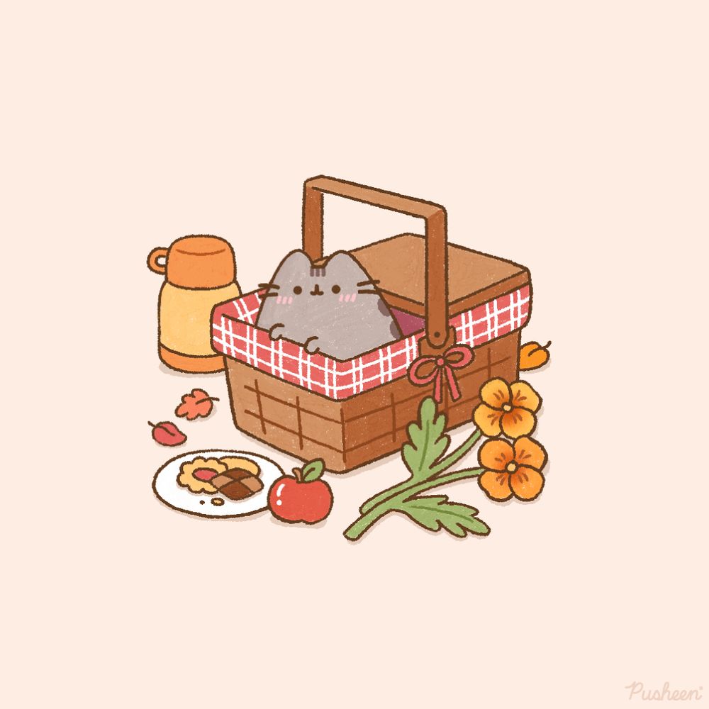 Pusheen sits inside of a picnic basket. On the ground there is a plate of cookies next to an apple. There are orange flowers and a thermos.