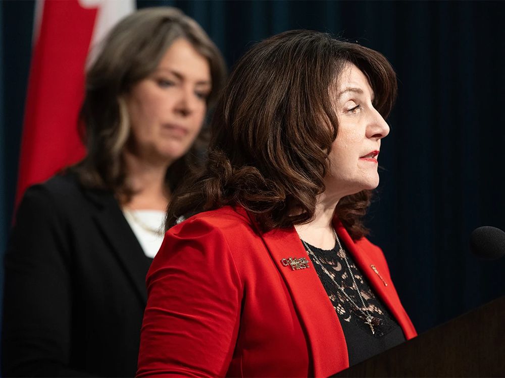 Danielle Smith and Adriana LaGrange at a press conference.