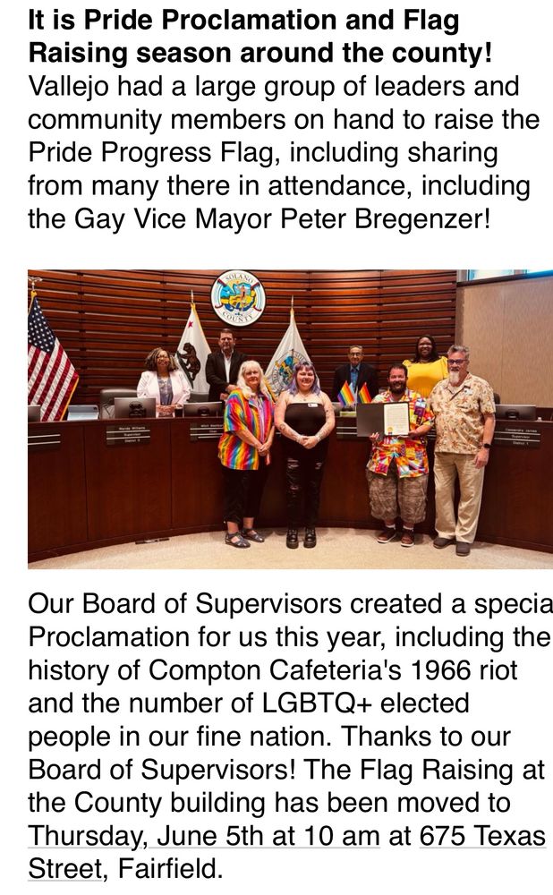 Mohagany desk with compiters and microphones surrounded by public
Servants, County Supervisors, Monica Brown in front with her rainbow shirt to show support and me
And Will :) pride proclamation!