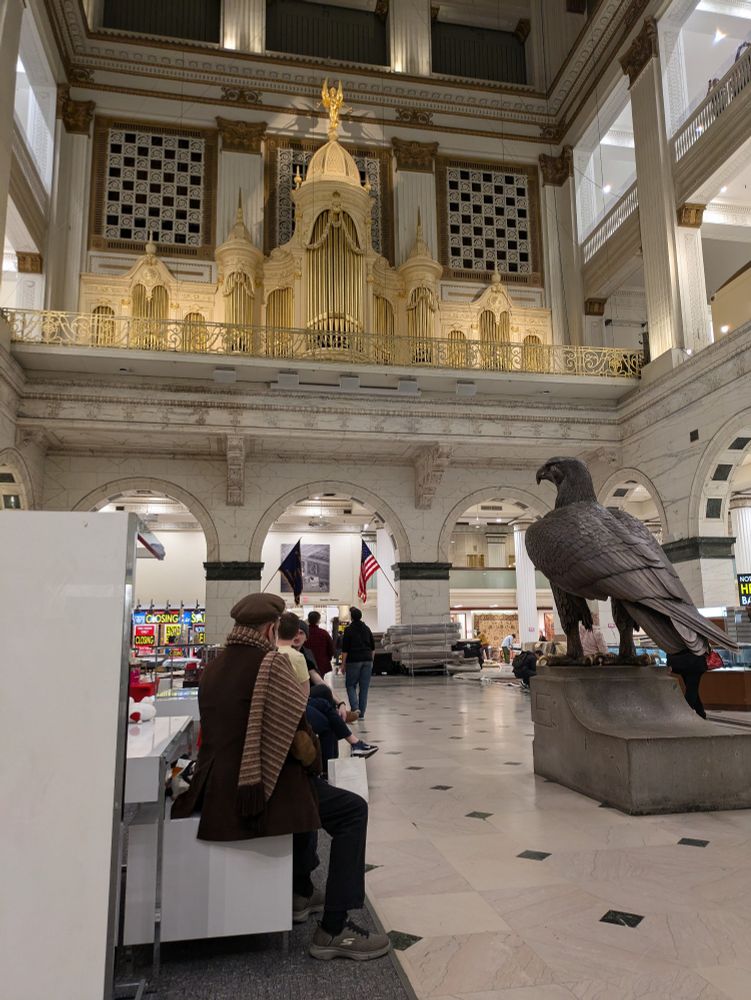 Macy's Grand Court in Philly, with empty racks and displays