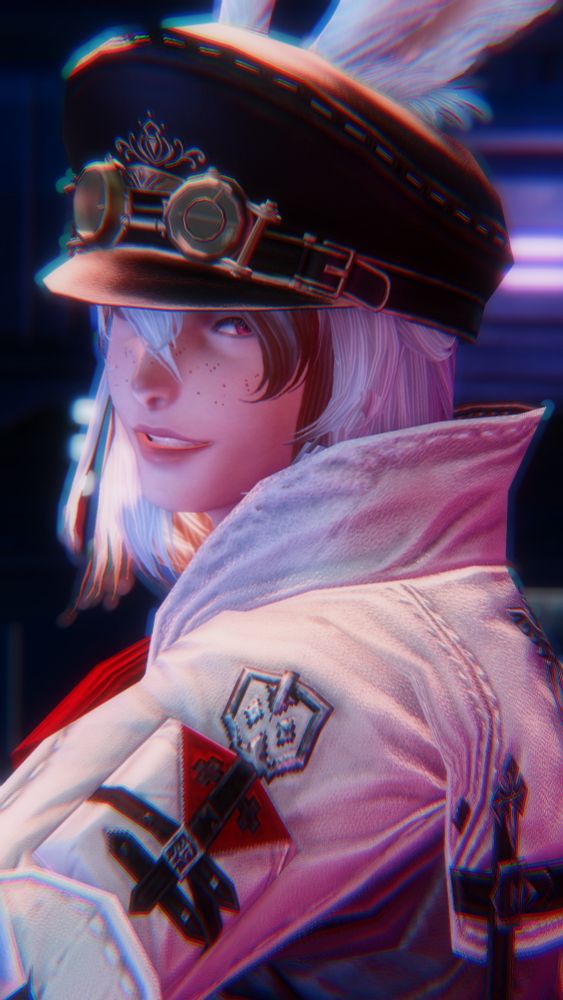 Knit smiling and looking at the camera whILE WEARING A HAT