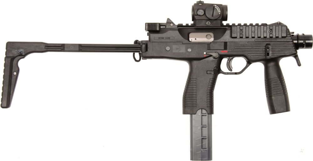 an mp9 from its side, with a red dot sight. it looks very similar to the mp7