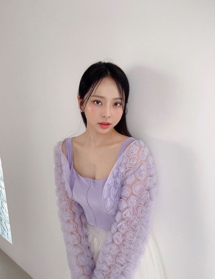 vivi in purple shirt and white skirt