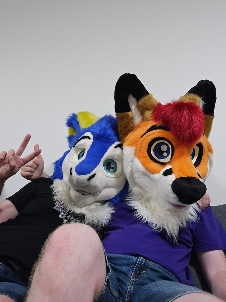Kydos and Colto on a couch