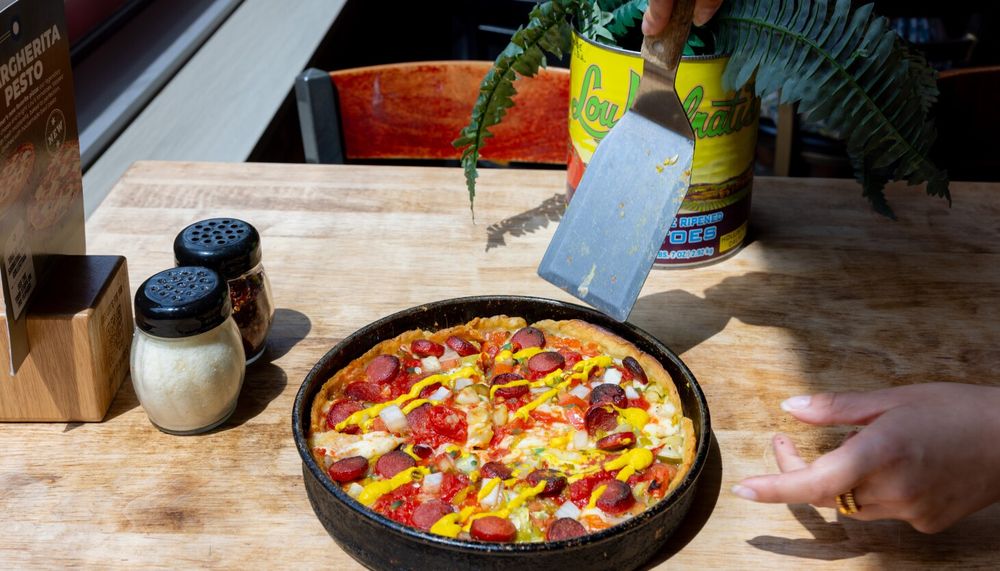 A Chicago hot dog deep dish pizza? Some say yuck to Lou Malnati's, Portillo's experiment