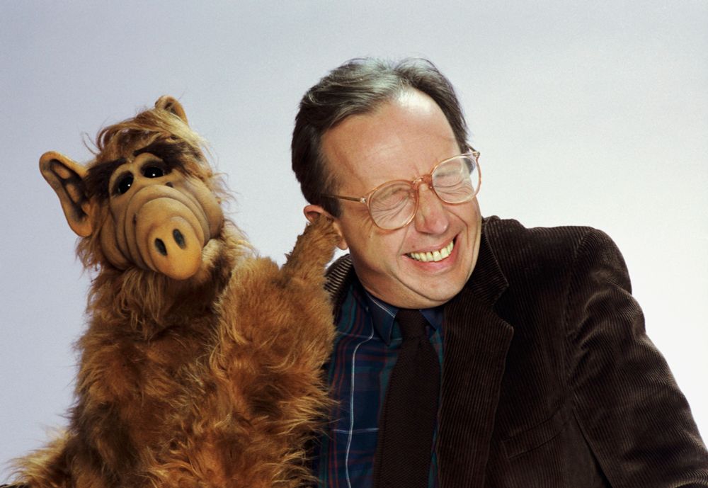 ALF shoving his mighty finger in Willie's ear