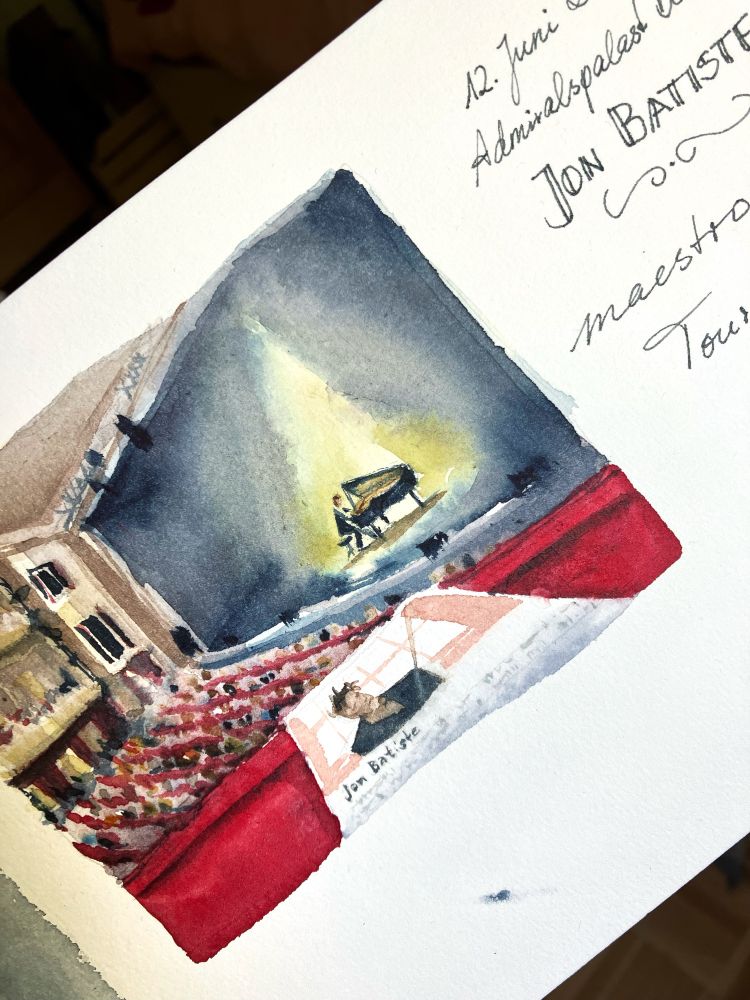 Sketch of concert hall, looking on the stage, Jon Batiste at the grand piano, programme leaflet in the foreground.