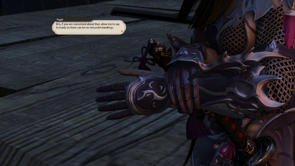 A close-up shot as Yugiri clasps her right hand over her left wrist, preparing to remove her glove.  At the same time she says "If you are concerned about that, allow me to say it clearly so there can be no misunderstandings"