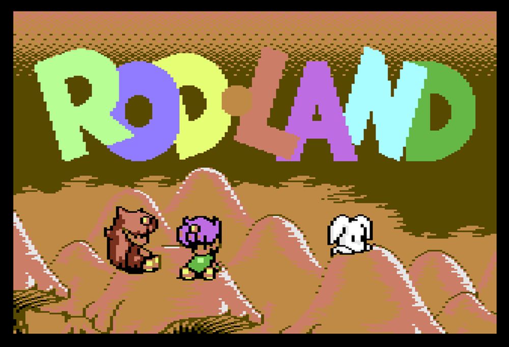 Pretty nice loading screen for RODLAND on the C64, looks very cute in pink and the colourful RODLAND title and the two players in hi res colour, sitting on very big hills. And a cute bunny, or something.