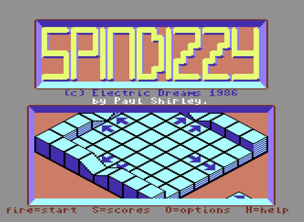 THe "Spindizxzy" title screen on the C64 depicting the 3D start screen in cyan and dark blue. The SPINDIZZY logo is at the top.