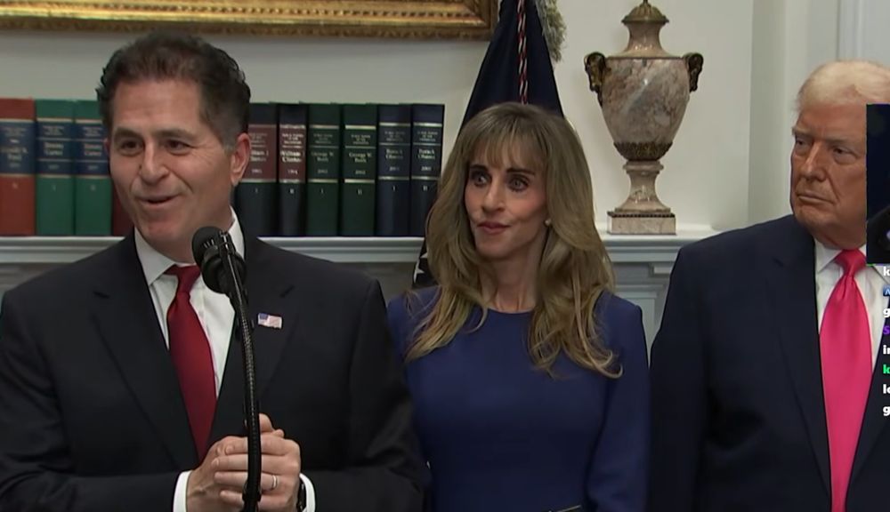 Michael Dell and Susan Dell, Susan looking like a villain in a Tim Burton Claymation movie. 