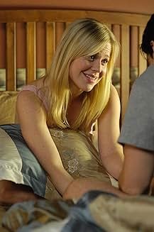 Kristin Booth interpreta a Abby