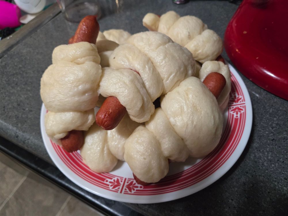 Some bao on a plate. Looks ok. Tastes great though. 