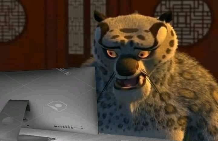 Tai-lung looking at a computer shocked
