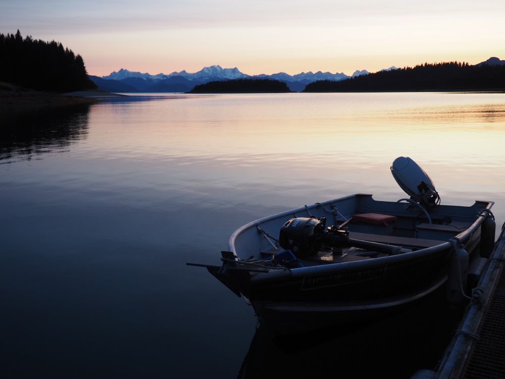 A boat in Glacier Bay NP at sunset