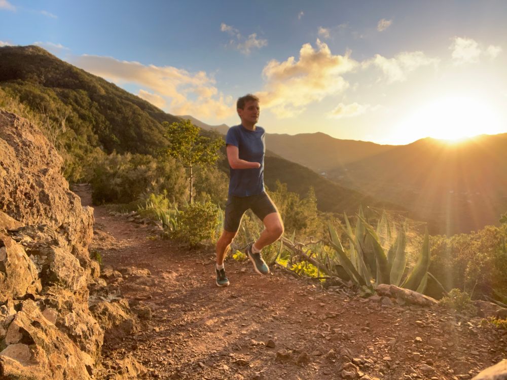 Running on a trail at sunset