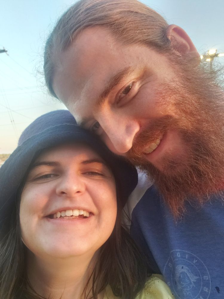 My husband and I smiling for our 5th anniversary.