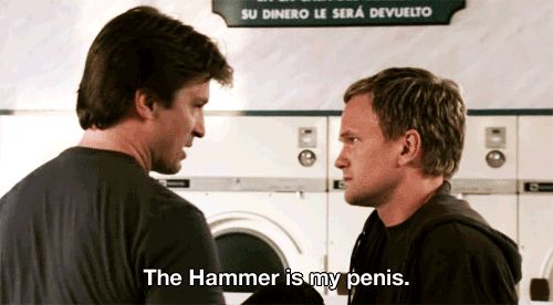GIF of Capt. Hammer saying “The hammer is my penis” to Dr. Horrible in Dr. Horrible’s Singalong Blog.