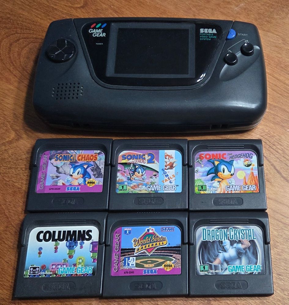 A Sega Game Gear with an assortment of games
