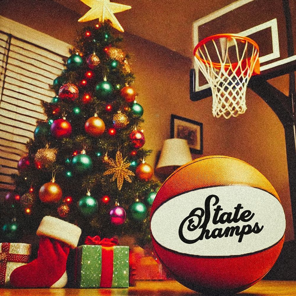 A WNBA style basketball with the State Champs logo in the foreground, behind the ball is a basketball hoop and Christmas tree with presents

