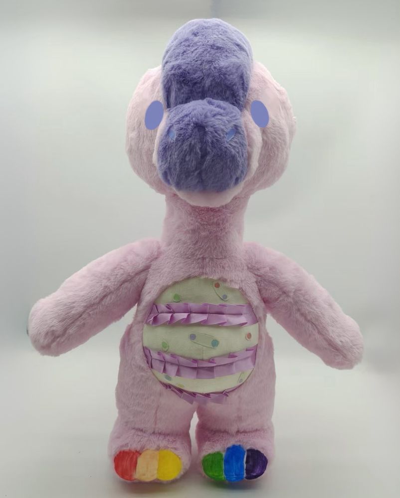 Photo of a plush dinosaur from the Rawrcade plush series. Confetti the giraffatitan, front view. 