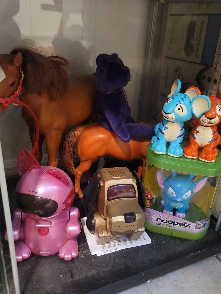 More mostly thrifted toys (except for my Princess Diana beanie babie). I never had those horse toys growing up, but I knew people who did and always wanted them. (Not sure why my parents never got them for me.) I had the turquois kougra toy as a kid, but these three neopets I got as a bundle. I also had an identical poo-chi and meow-chi as a kid, but mine were unfortunately sold in a garage sale. I like to pretend these are actually mine come home—my old poo-chi also had a broken tail, just like this one.