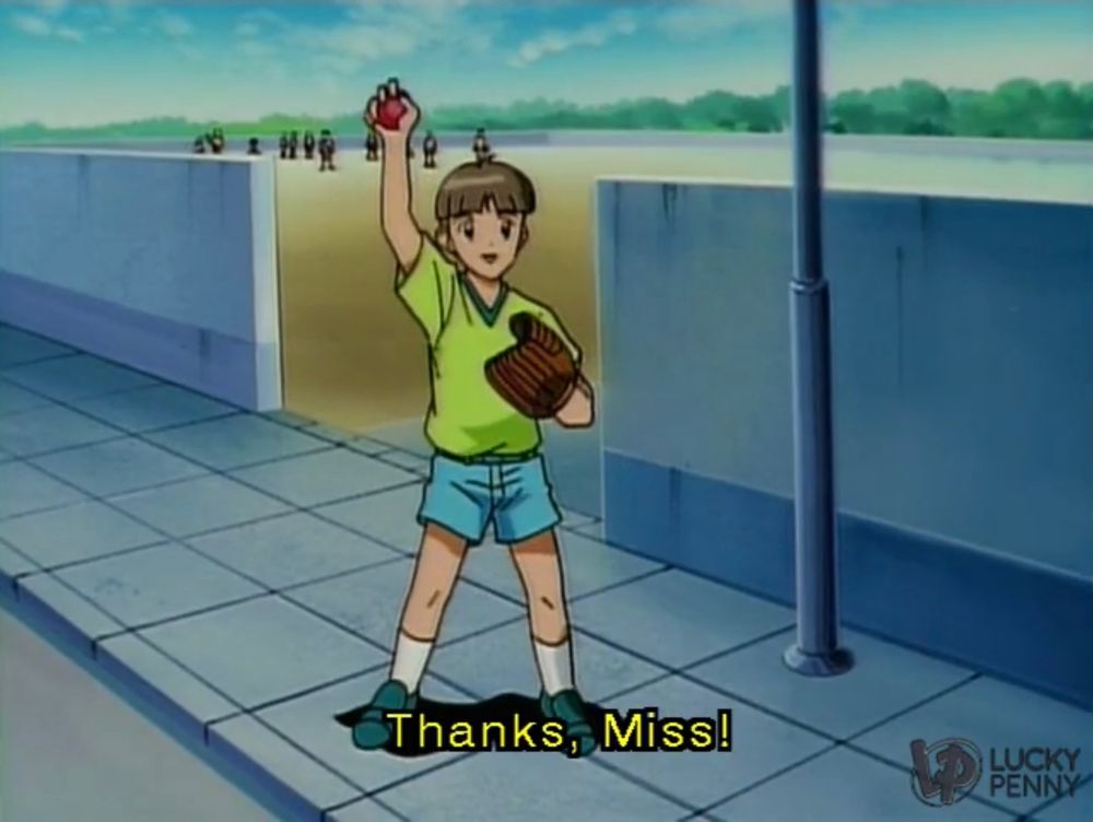 A screenshot from the anime Princess Nine featuring a boy with a bowl cut, green shirt, and blue shorts. He resembles Üso Ewin of Mobile Suit Victory Gundam