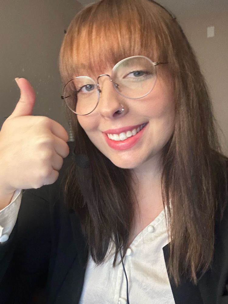 me with thumbs up and smiling 
