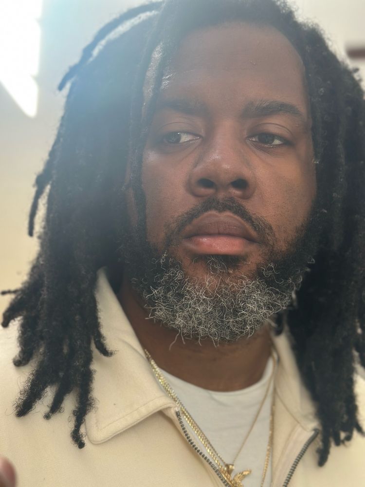 A pensive, grey-haired sex symbol