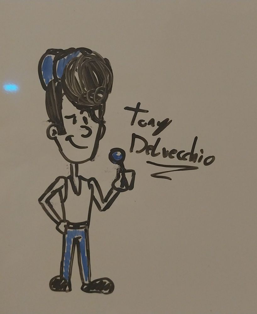 A image of Tony Delvecchio, an Italian, skinny kid with a pompadour, wearing a tank top, baseball cap and jeans, holding a spherical lollipop.