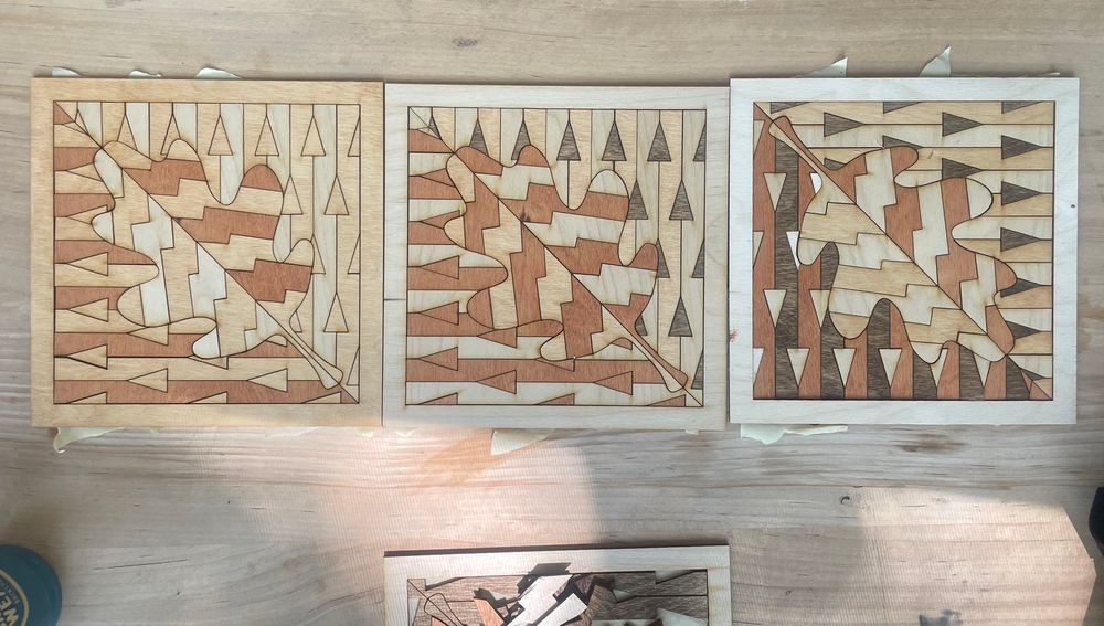 Laser cut wood oak leaf pattern art.  3 squares w geometric motif stained wood. 