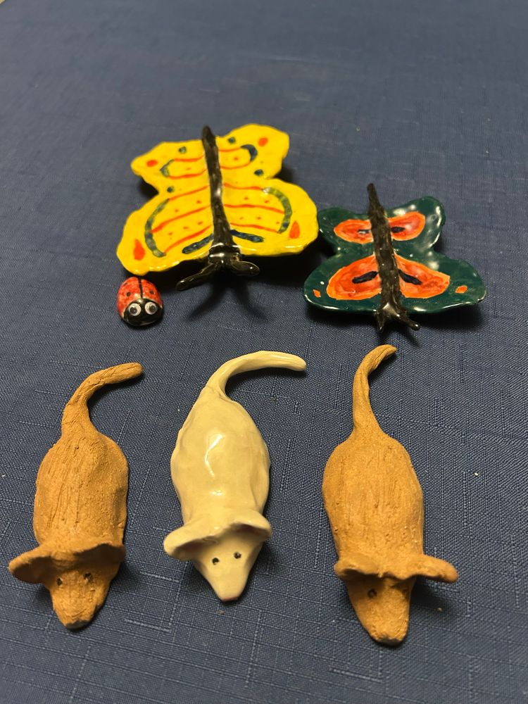 Little pottery animals.  3 mice, two butterflies and one little ladybug 