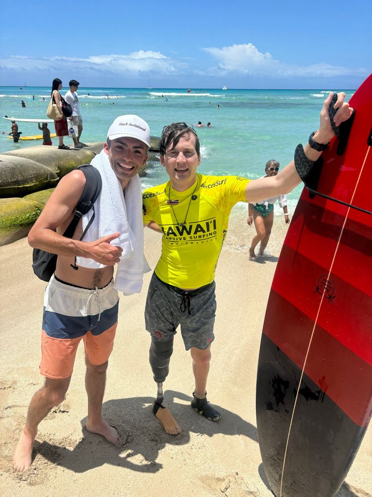 My cousin and nephew celebrating a big day on the water at Waikiki beach 🤙