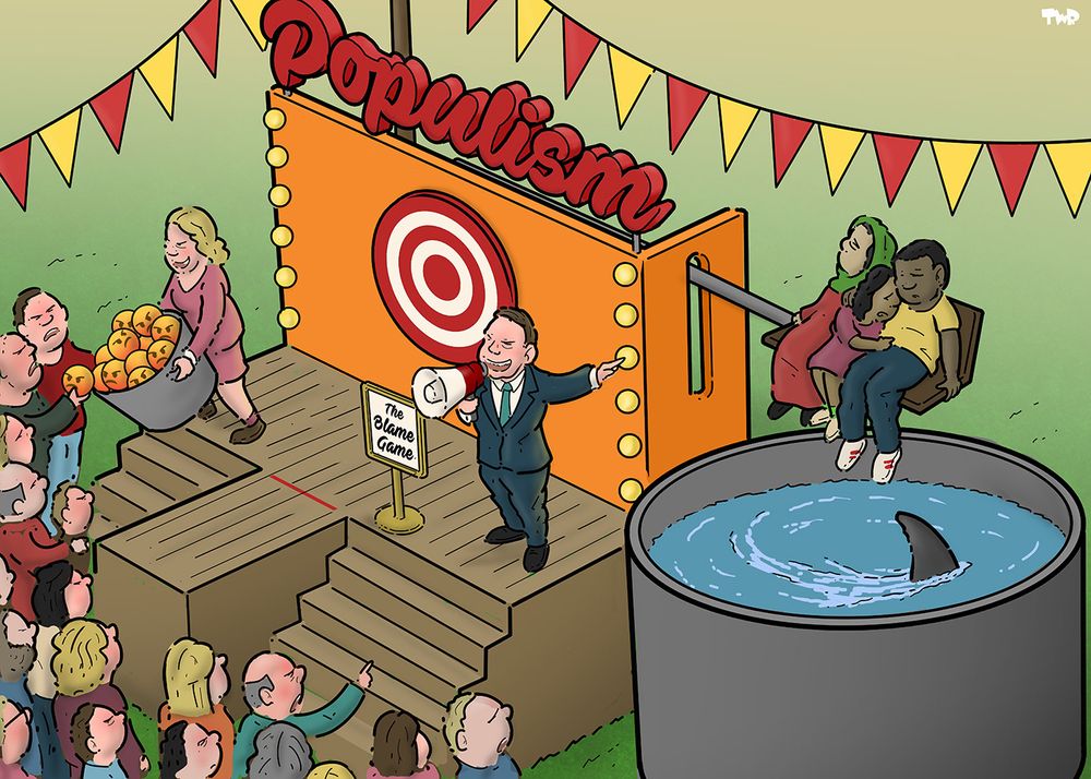 Cartoon showing a carnival attraction, where (white) people are standing in line to throw balls at a bullseye, which will cause a migrant family to be dunked in a tank with a shark swimming in it, while a man with a megaphone is egging them on. The balls are actually angry emoticons. A sign says 'The blame game'.