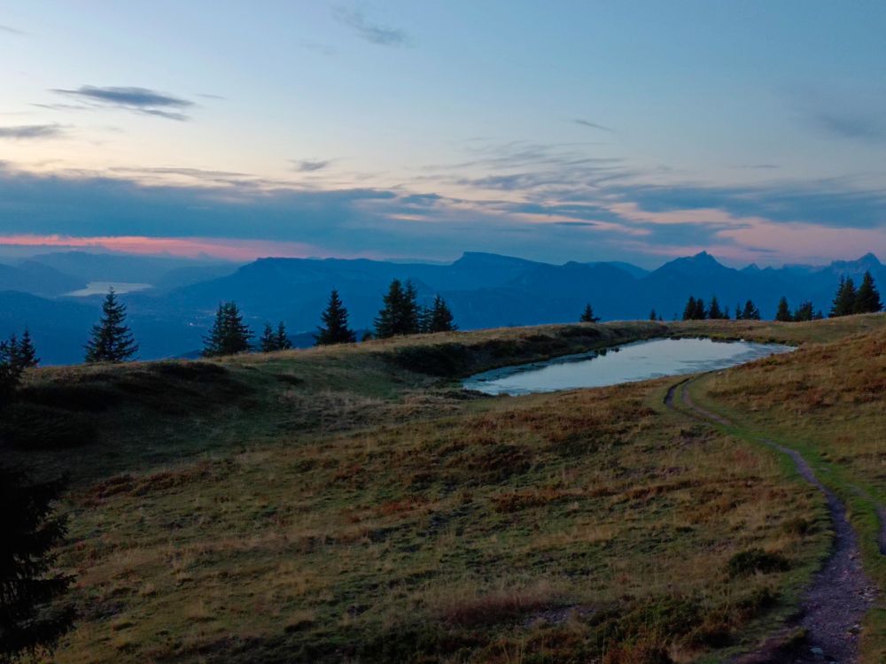 Looking northwest from the Belledonne range, France, at sunset. The Lac du Bourget in the distance.
