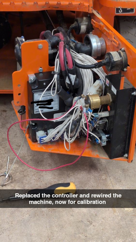 The controller is fully replaced with wiring modified and a jumper wire on the power to enable testing on the unit. Text stating "Reached the controller and rewired the machine, now for calibration"
