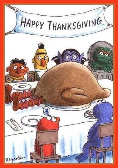 Cartoon of Sesame Street characters around a thanksgiving table. 