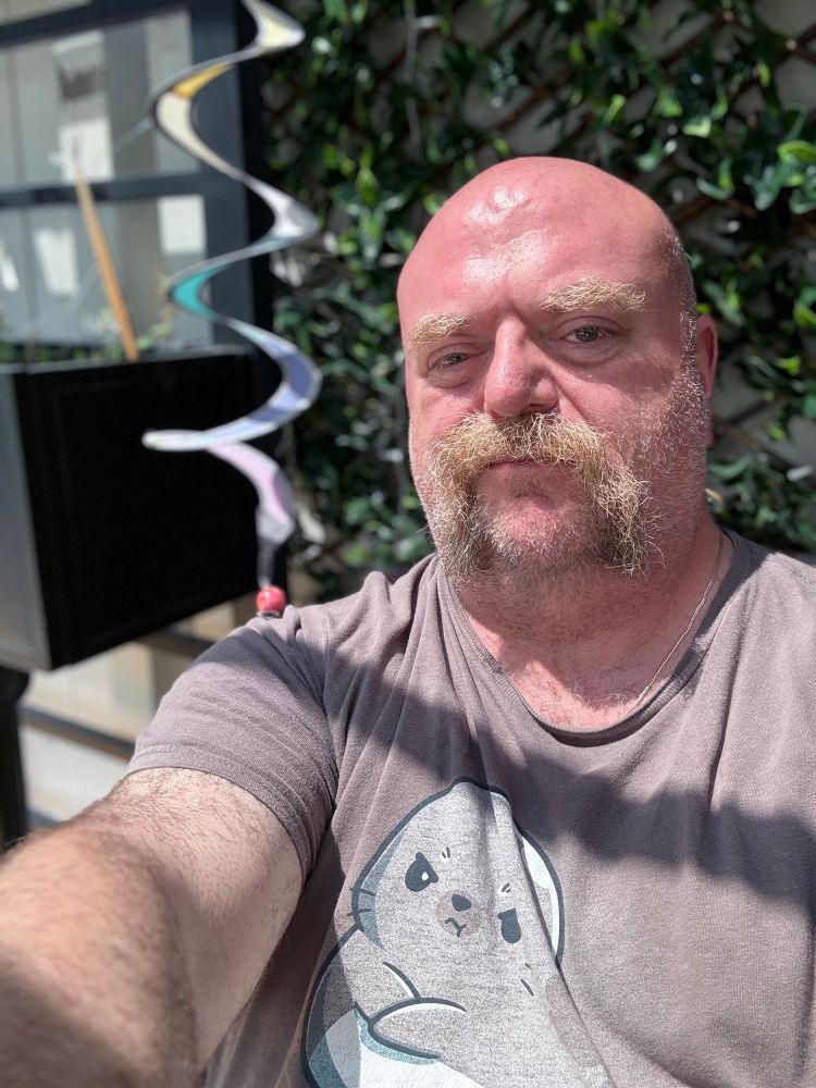 Man outside in sun. 