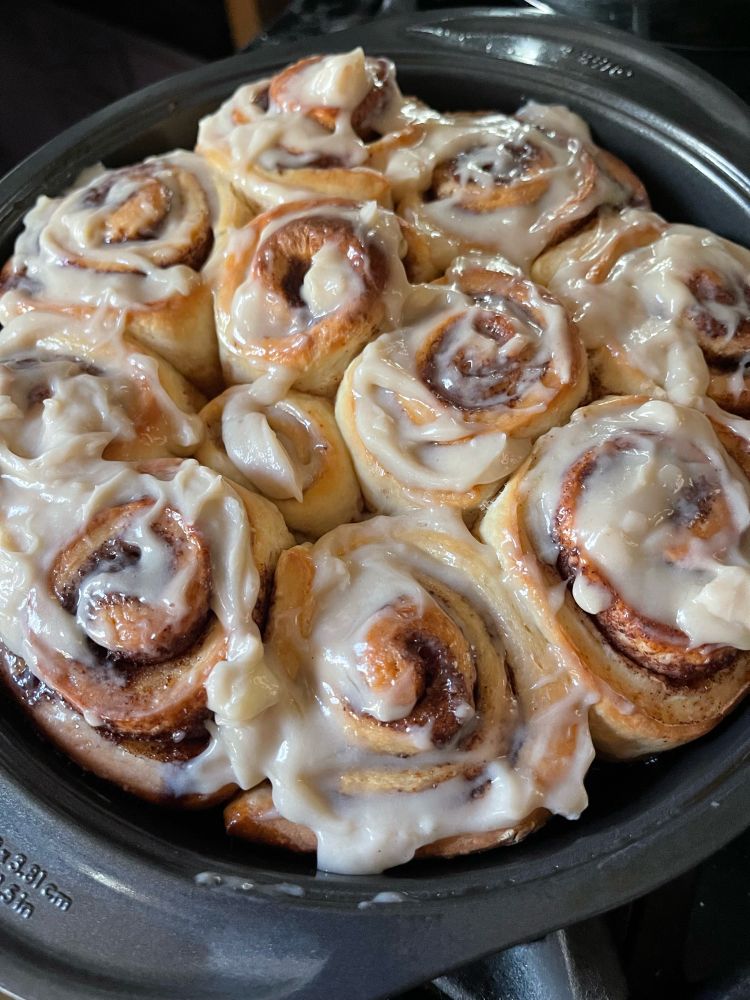 Fresh baked cinnamon rolls with cream cheese frosting. 