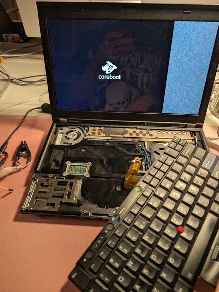 Booting the Thinkpad X220 now shows the coreboot logo splash screen instead of Lenovo's. The logo is a white rabbit running to the right on top of a coreboot wordmark on black background.