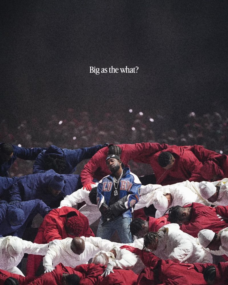 Photo of Kendrick Lamar’s 2025 halftime show where his backup dancers are dressed and posed as the American flag with Kendrick standing in the middle 