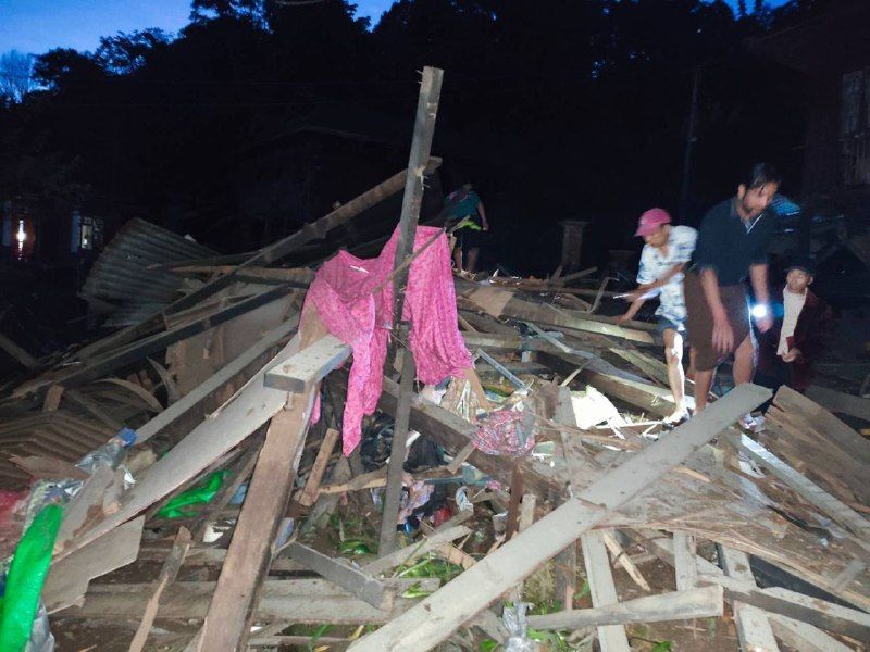 Residents of Mogok Township, Mandalay Region, inspect the destruction caused by an airstrike on Aug. 9. (Credit: TNLA)
