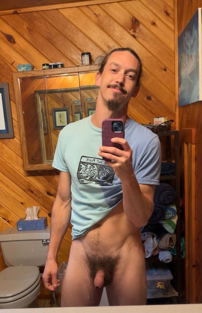Half naked in my boyfriend’s shirt sporting a hooded softie among a full bush.