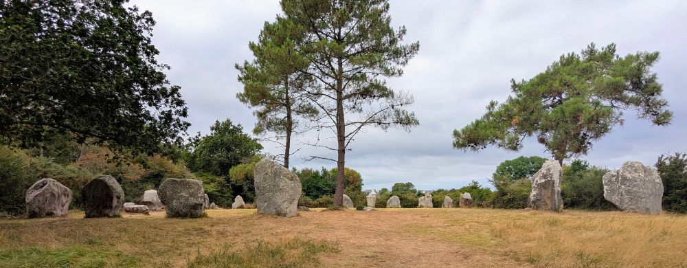 View entering the Cromlech, walking up a slight slope towards one of the long edges of the rectangle of stones.