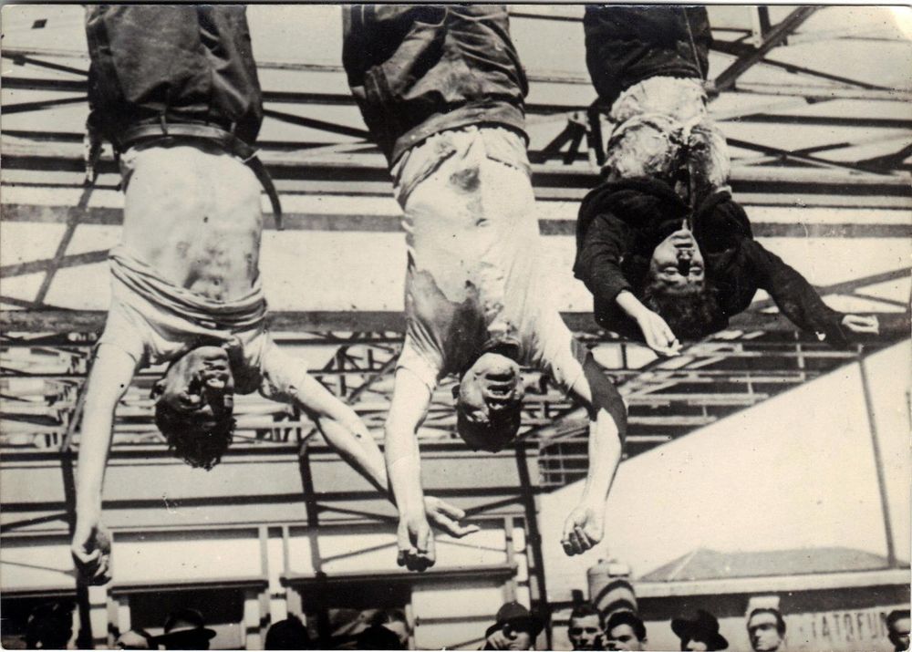 Dead people hanging upside down.