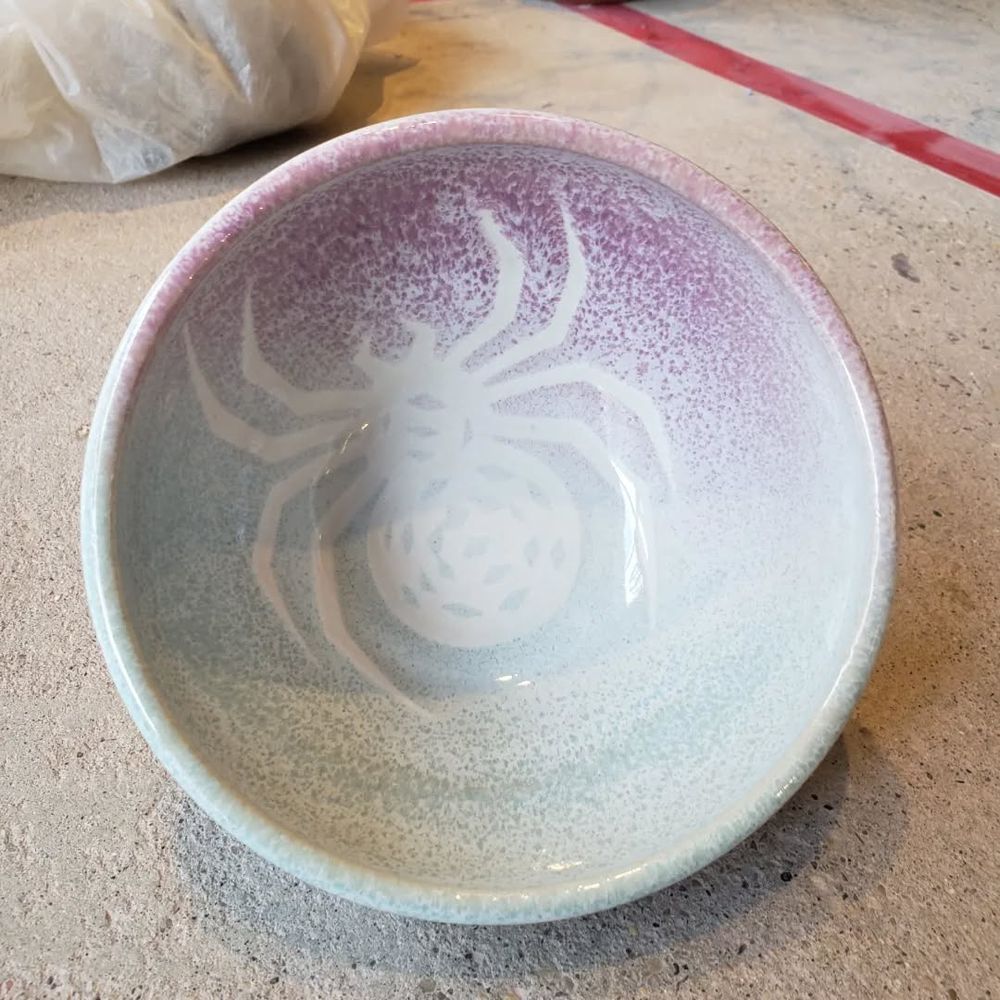 Small bowl with spider design