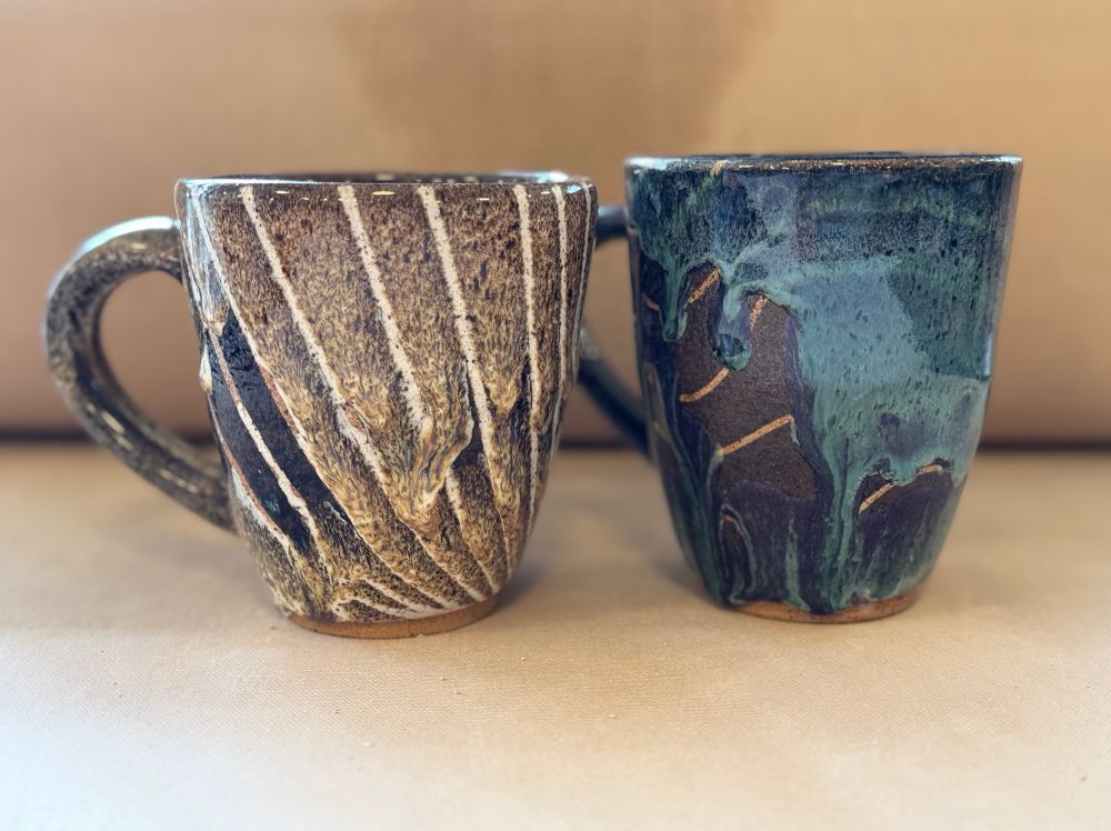 2 mugs with glaze defects (crawling)