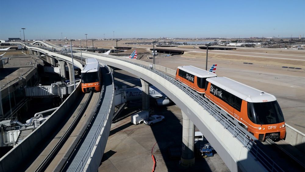 a picture of the DFW skytrain. why does it go over the tarmac