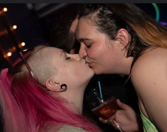 Em and i sharing a smooch and also a sangria which she’s holding 