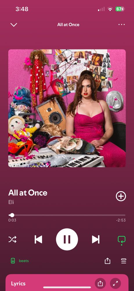 A screenshot from the singer Eli’s song All at Once, with pink accents 